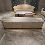 Curved Marble-Top TV Stand with Cream Glossy Panels and Continuous Metal Base